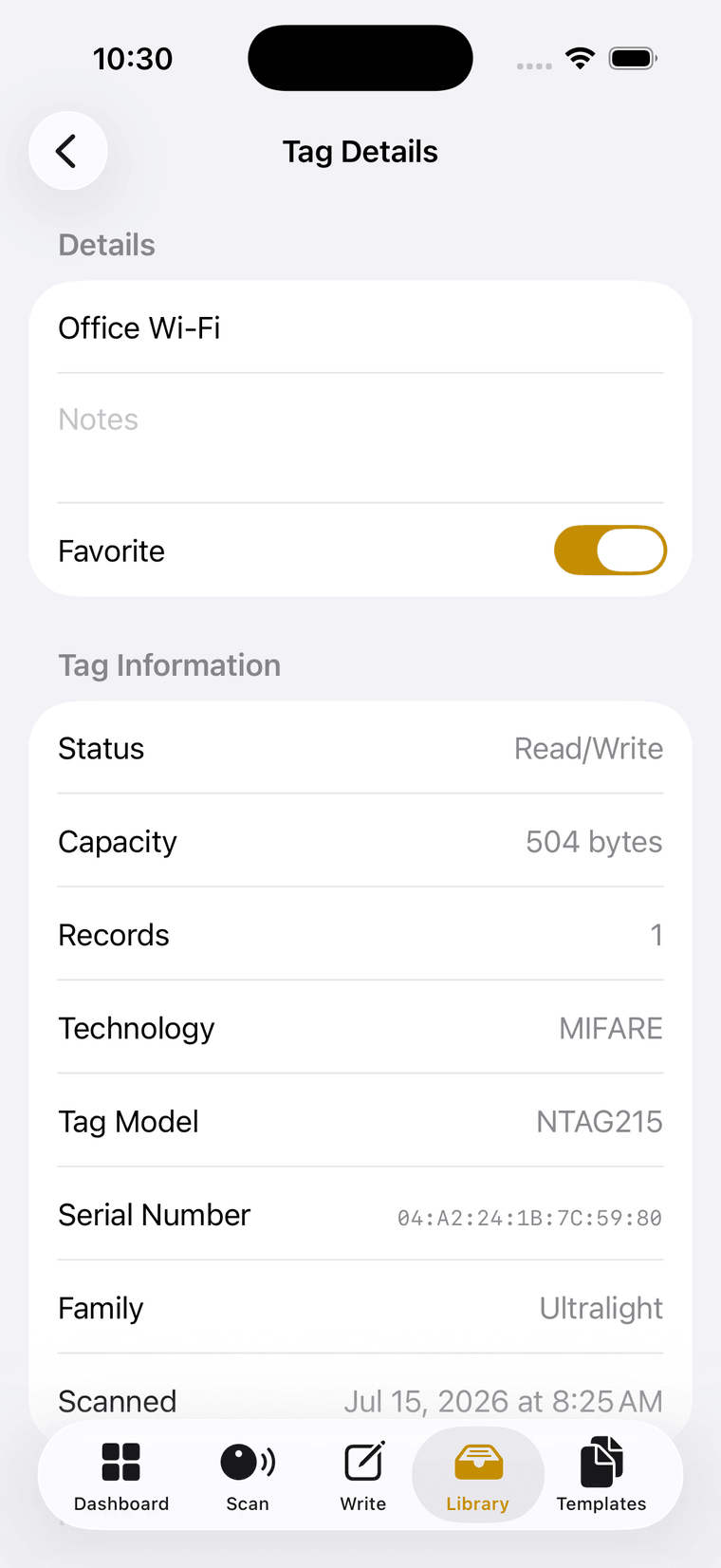 The Tag Details screen: spec rows listing status Read and Write, capacity 504 bytes, technology MIFARE, tag model NTAG215, serial number and scan time.